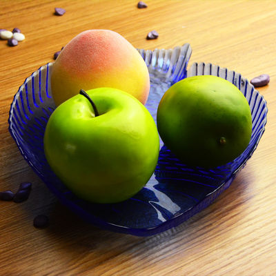calidad Placas de carga de color sólido en forma de pez para frutas fábrica