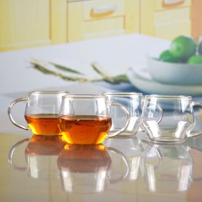 calidad Taza de vidrio de té resistente al calor con mango fábrica