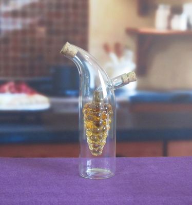 calidad Envases de vidrio de doble capa en forma de uva con tapa para aceite fábrica