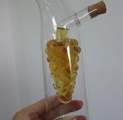 calidad Envases de vidrio de doble capa en forma de uva con tapa para aceite fábrica