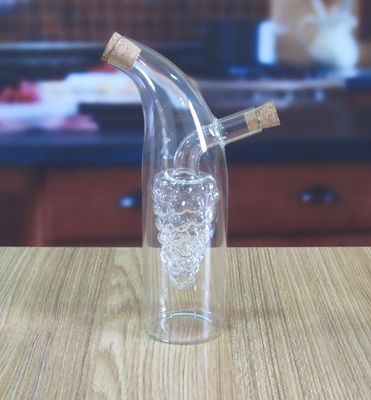calidad Envases de vidrio de doble capa en forma de uva con tapa para aceite fábrica