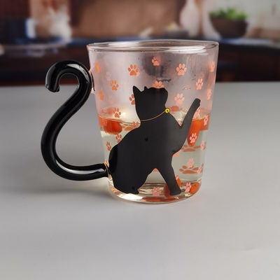 calidad Taza de vidrio de té de gato negro de borosilicato con mango de cola de color fábrica