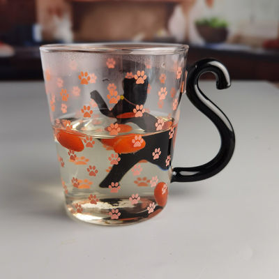 calidad Taza de vidrio de té de gato negro de borosilicato con mango de cola de color fábrica