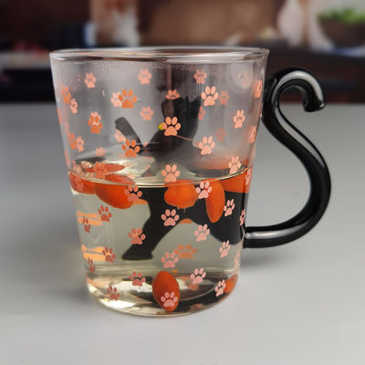 calidad Taza de vidrio de té de gato negro de borosilicato con mango de cola de color fábrica