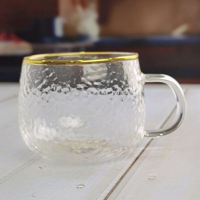 calidad Borosilicato martillado textura tumbler copas de beber con borde dorado fábrica